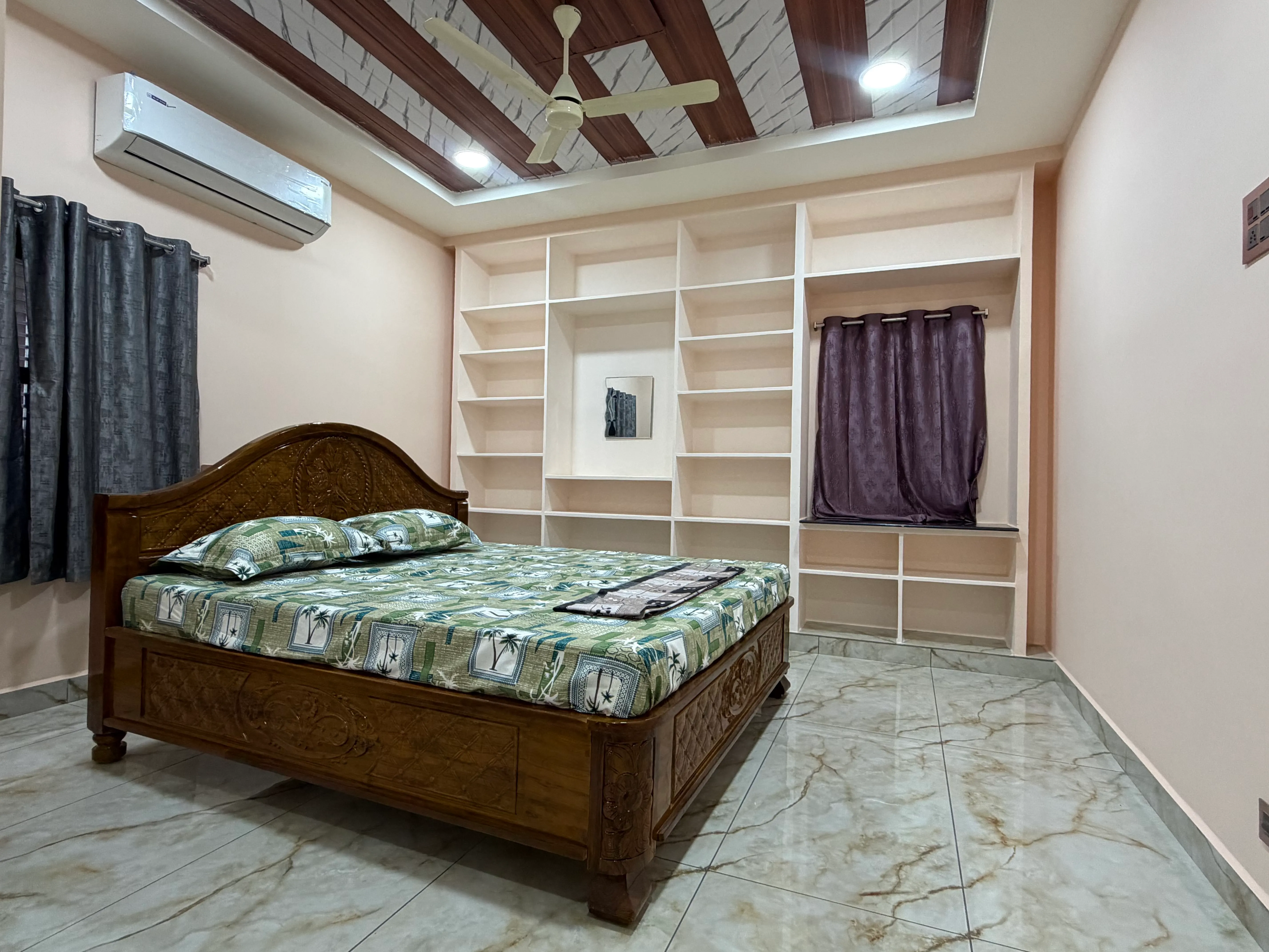 Bedroom with carved wooden bed